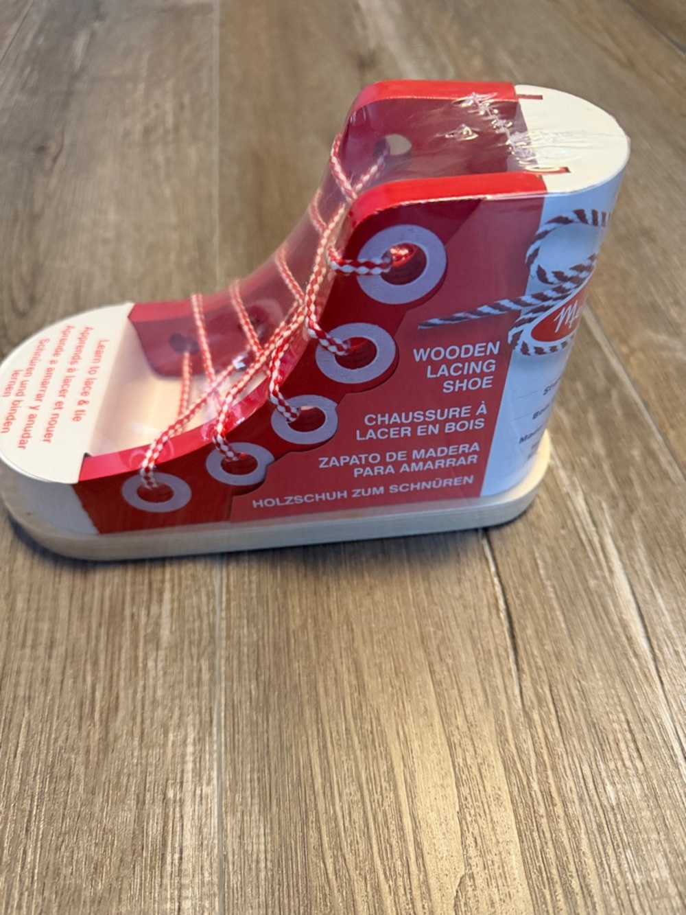 Melissa & Doug Wooden Lacing Shoe Toy in Red and White